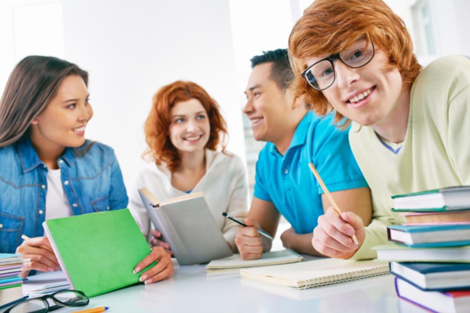 Business professionals analyzing financial metrics on digital screens